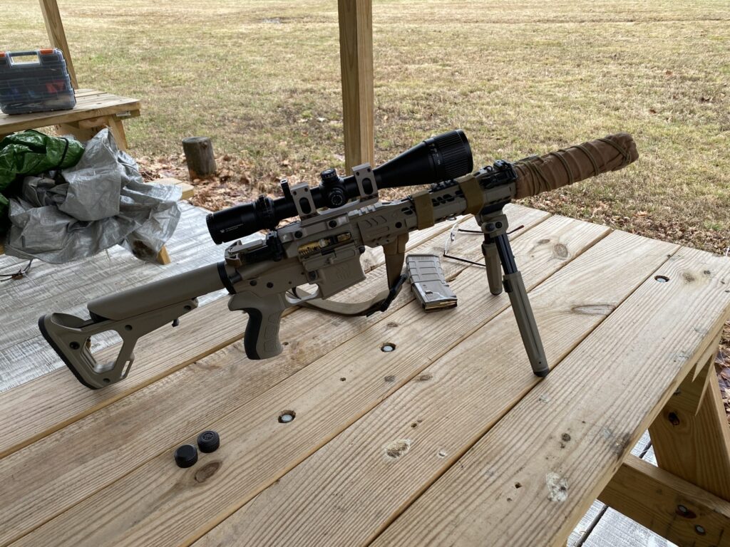 ar 15 pistol silenced outdoor range scaled